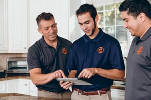 911 restoration team in kitchen